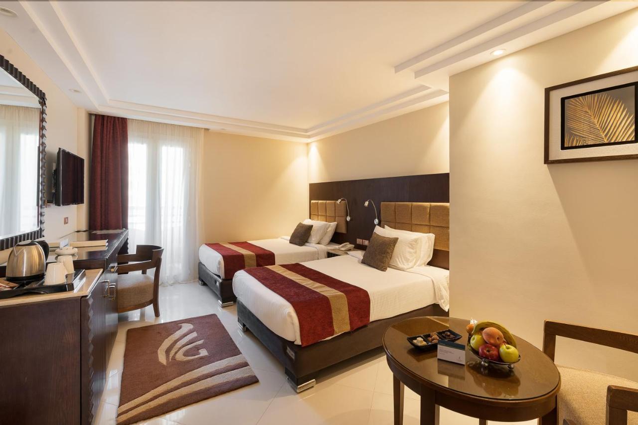 מלון עיין סוחנה Grand Ocean El Sokhna מראה חיצוני תמונה A room at the hotel